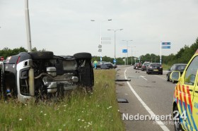 Ongeval afrit A2 bij Weert Noord, twee personenauto's