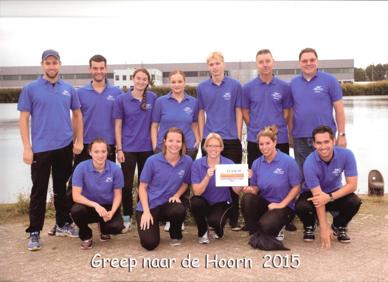 Teamfoto Greep naar de hoorn