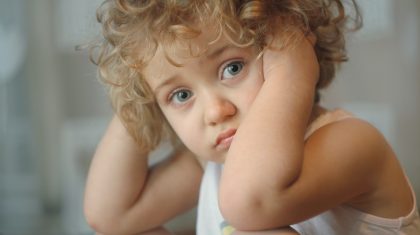 Beautiful little girl with big blue eyes